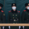 Полицаи със защитни маски охраняват главен път в Пекин, Китай, 31.01.2020 г.(Kevin Frayer)