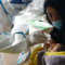 Медицинско лице прави на новородено тест за наличие на COVID – 19 в Шъдзяджуан, провинция Хъбей, Китай, 07.01.2021 г. (STR/CNS/AFP via Getty Images)