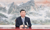 Китайският президент Си Дзинпин произнася реч на срещата на върха на изпълнителните директори на страните от Азиатско-тихоокеанското икономическо сътрудничество (АТИС) чрез видеовръзка, Пекин, 11 ноември 2021 г. (Li Xueren/Xinhua via AP)