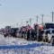 Колона от камиони пътуват към Отава, за да протестират срещу задължителната ваксинация, 25 януари 2022 г. (David Lipnowski/The Canadian Press)