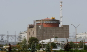 Запорожската атомна електроцентрала край контролирания от Русия град Енергодар в Запорожка област, Украйна, на 22 август 2022 г. (снимка; Александър Ермоченко/ "Ройтерс")