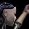 Робот с изкуствен интелект, озаглавен "Alter 3: Offloaded Agency", по време на фотосесия за популяризиране на изложбата "AI: More than Human" в центъра Barbican в Лондон на 15 май 2019 г. (Ben Stansall/AFP via Getty Images)