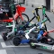 Електрически скутери на компаниите за споделена микромобилност Lime и Dott, паркирани за наемане на улица в Париж (Charles Platiau/Reuters)
