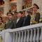Ким Чен Ун, Ли Хонгжун и Сергей Шойгу на военен парад в Пхенян, Северна Корея (KCNA via Reuters)