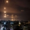 Ракети, изстреляни от терористите на Хамас от град Газа, са прихванати от израелската отбранителна ракетна система Iron Dome на 7 октомври 2023 г. (Mохамед Абед/AFP чрез Getty Images)