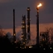 Комини на рафинерията на ExxonMobil по здрач в Сейнт Бернар, щата Лас Вегас, САЩ (Джералд Херберт/AP Photo)