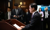 Главният председател Джон Лий говори пред медиите в сградата на Законодателния съвет след приемането на член 23 от Закона за националната сигурност в Хонконг на 19 март 2024 г. (Peter Parks/AFP via Getty Images)