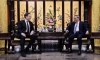Илон Мъск на среща с китайския министър Ли Цян в Пекин, 28 април 2024 г. (Wang Ye/Xinhua via AP)