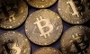 Bitcoin монети (Dan Kitwood/Getty Images)