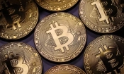 Bitcoin монети (Dan Kitwood/Getty Images)