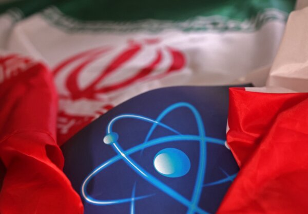 An atomic symbol and the Iranian flag are seen in this illustration taken Sept. 8, 2022. (Reuters/Dado Ruvic/Illustration/File Photo)