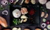 top view plate vegetables as garlic cut scallion with onion egg spices moaoaroon background