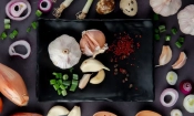 top view plate vegetables as garlic cut scallion with onion egg spices moaoaroon background