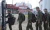 Руски военнопленници под 25 години се качват на самолет за Беларус. След това те ще бъдат върнати в Руската федерация. Снимка: ТАСС