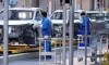Volkswagen планира да съкрати предлаганите модели, докато търсенето на електромобили в Европа нараства 2 Служители работят на поточната линия в завода за електрически автомобили MEB на SAIC Volkswagen в Шанхай, Китай, 8 ноември 2019 г. (Aly Song/Reuters)